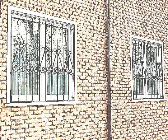 Кованые ограждения на окна (фото)